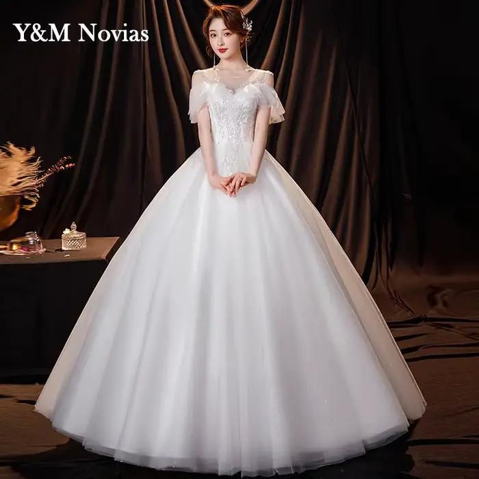 Robe de mariée ivoire à col rond personnalisée