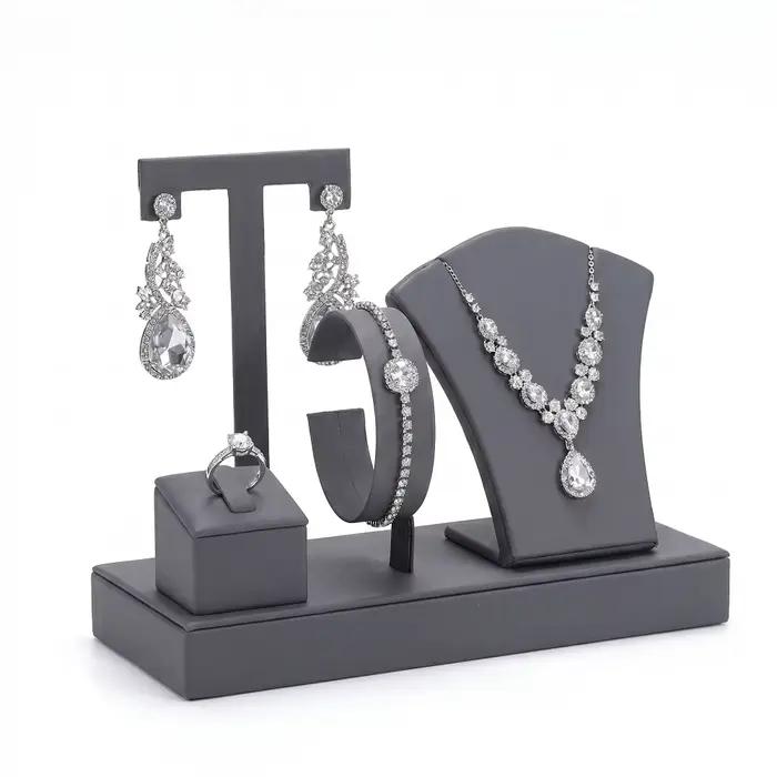 Ensemble de présentoirs à bijoux en cuir PU, 4-en-1 : buste à colliers, support à boucles d'oreilles, coussin à bagues, support à bracelets pour boutique et coiffeuse