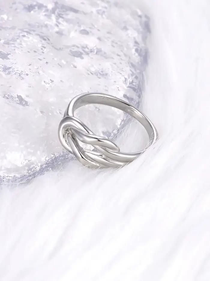 Bague AENINE en acier inoxydable plaquée or 18 carats design noeud pour femmes occasions spéciales romantique élégante cadeau de mariage