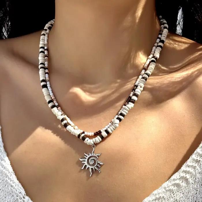 Collier Vintage Boho en perles de bois de noix de coco pour femmes, 2 pièces, pendentif soleil de Style ethnique, perles de riz, bijoux cadeaux de fête sur la plage