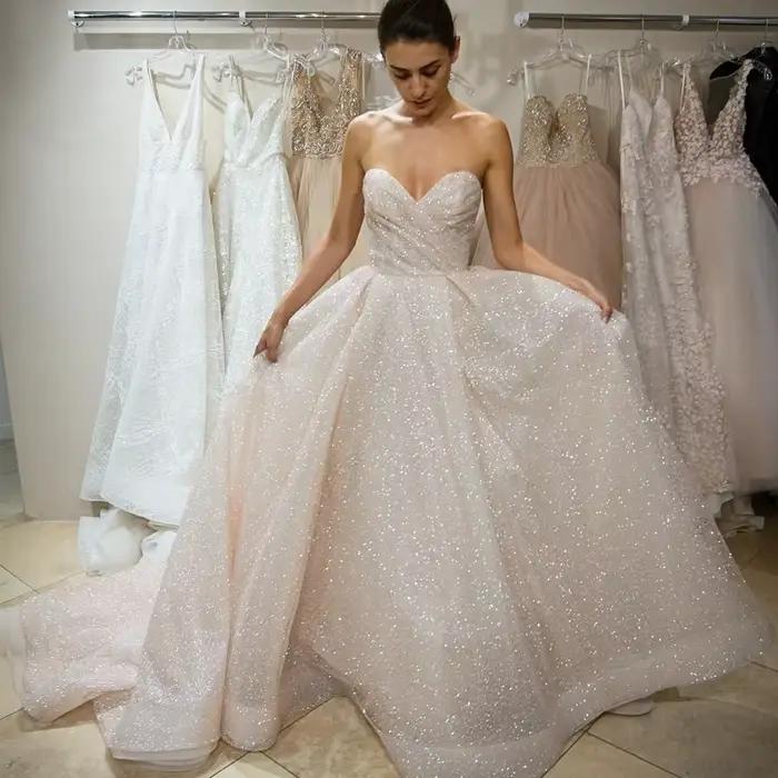 Robes de mariée princesse brillantes personnalisées