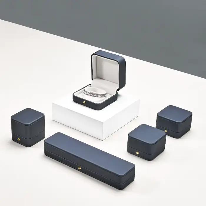 Coffret à bijoux en cuir bleu marine et velours blanc pour colliers, bagues, organisateur cadeau/stockage Premium pour emballage de bijoutier de luxe