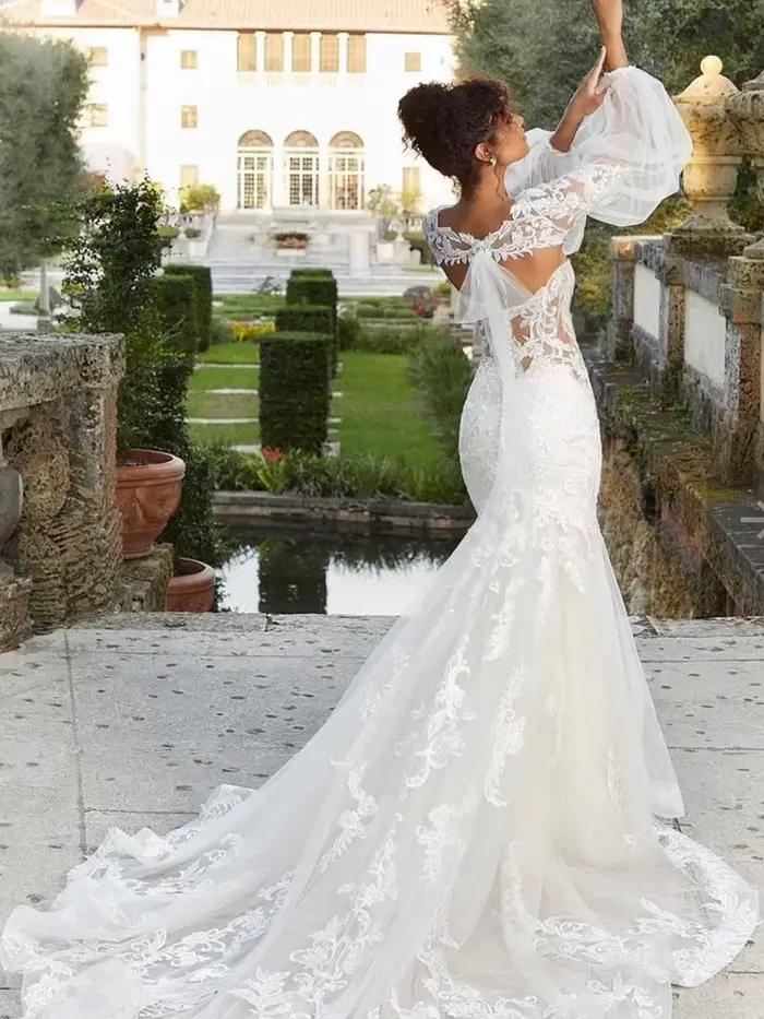 Robe de mariée sirène/trompette sexy avec appliques, exquise, traîne courte, dos illusion en dentell