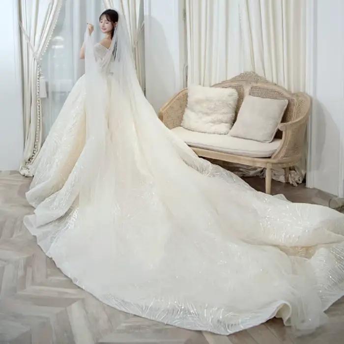 Robe de mariée de luxe paillettes classique col bateau épaules dénudées personnalisée occassions spéciales mariage traditionnel remariage