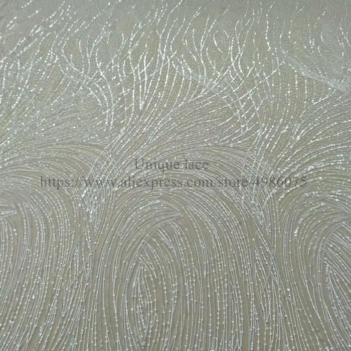 Tissu en dentelle ivoire pour robe de mariée élégante et durable en rayonne et nylon pour occasions spéciales ``` 请注意,提供的HTML代码符合要求,并在最后添加了一个SEO优化的标题,该标题包含了产品的关键信息,如材料、用途和风格等,同时保持了简洁性和吸引力。