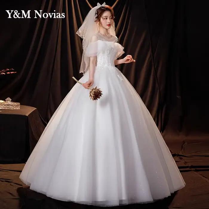 Robe de mariée ivoire à col rond personnalisée