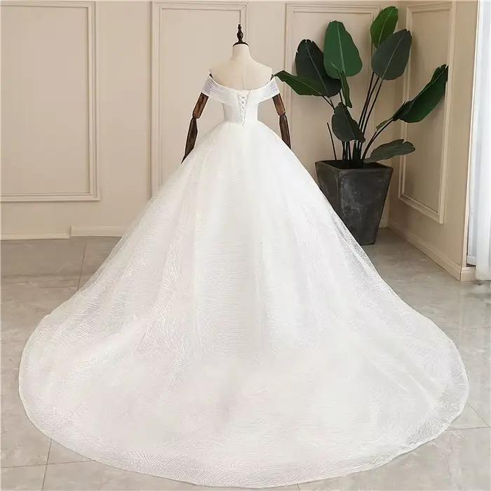 Robe de mariée de luxe paillettes classique col bateau épaules dénudées personnalisée occassions spéciales mariage traditionnel remariage