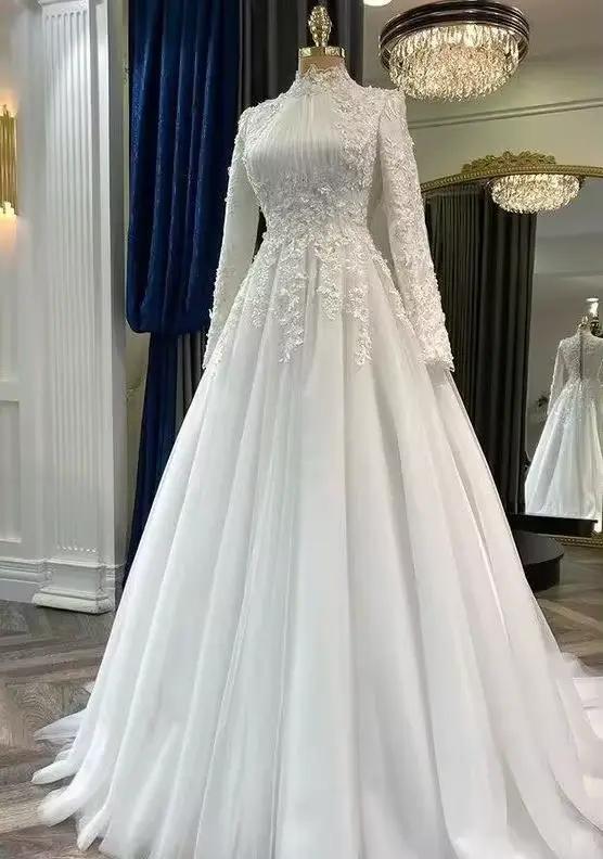 Robe de mariée à manches longues personnalisée
