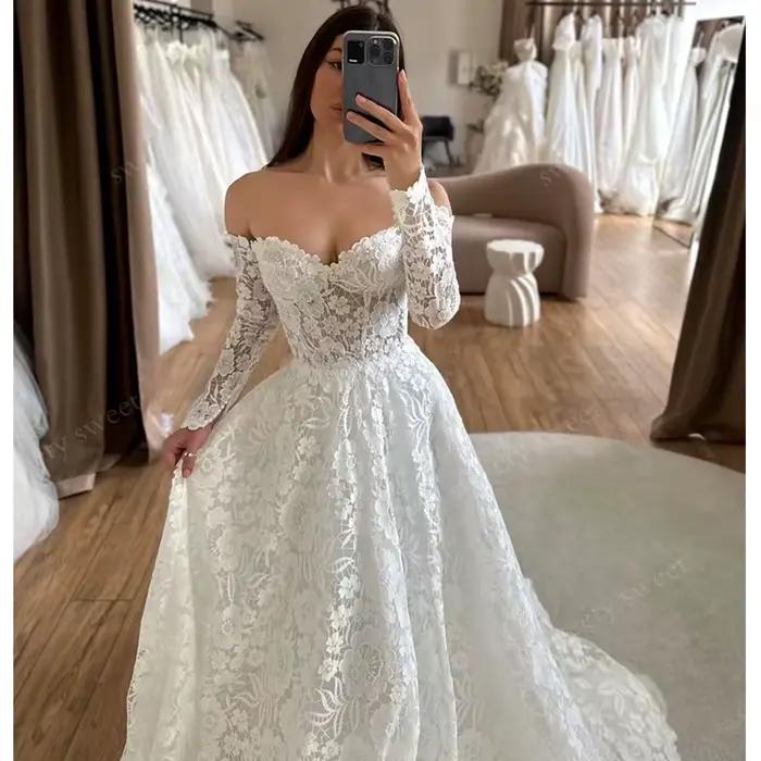 Robe de mariée exquise à fleurs volumineuses