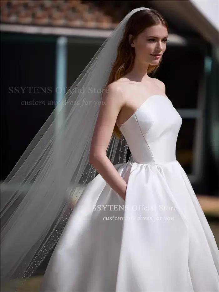 Robe de mariée élégante sans bretelles en satin