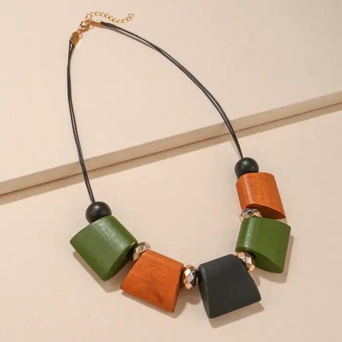 Femmes Vintage ethnique déclaration bavoir collier géométrique échelle bois perles colliers pendentifs nouvelle mode collier cou bijoux