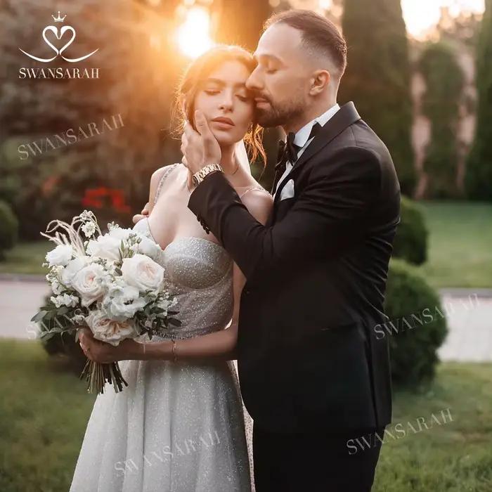 Robe de mariée brillante sans manches 2026