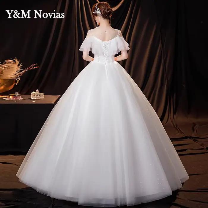 Robe de mariée ivoire à col rond personnalisée