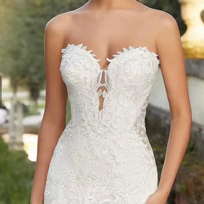 Robe de mariée sirène/trompette sexy avec appliques