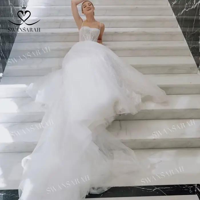 Robe de mariée brillante sans manches 2026