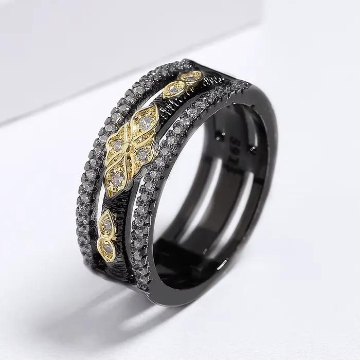 Bague bicolore noire et or pour femme