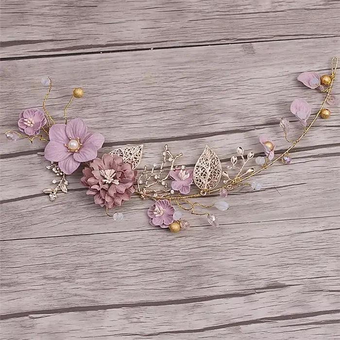 Serre-tête fleur rose pour cheveux longs