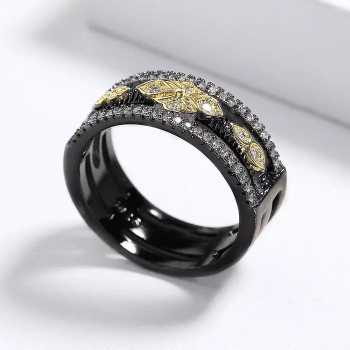 Bague bicolore noire et or pour femme