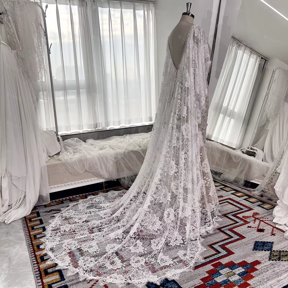 Robes de mariée Mryarce Boho Chic grande taille en dentelle, col plongeant, avec manches cape à gran