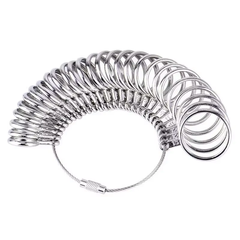Kit d'outils de mesure pour bagues en métal, comprenant un mandrin de mesure et un outil pour doigts