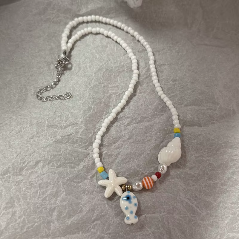 Collier bohème coloré pour femmes et filles, chaîne de cou perlée réglable, accessoire de mode Uniqu