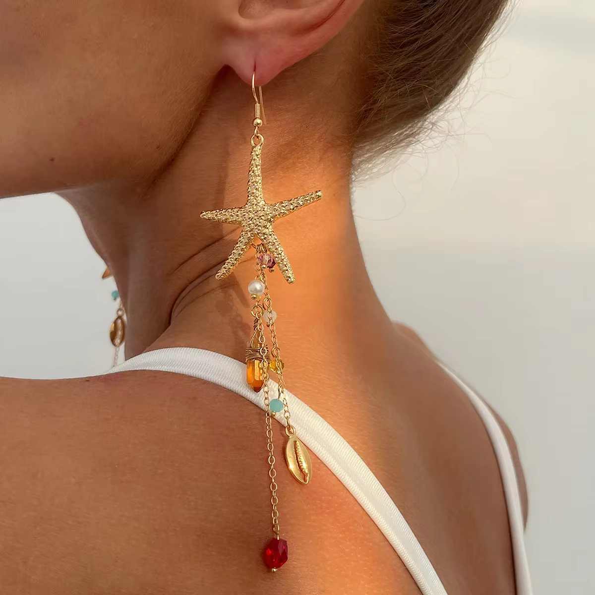 Boucles d'oreilles tendance étoile de mer pour femmes, coquille de méduse, chaîne en Zircon, pompon,