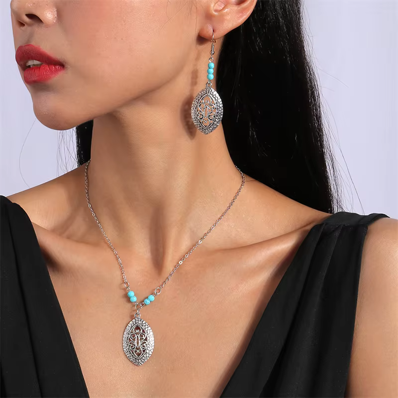 Ensemble de bijoux bohèmes en métal avec collier et boucles d'oreilles en forme de feuille d'arbre p