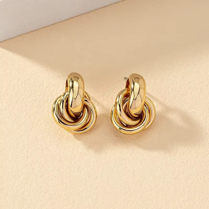 Boucles d'oreilles en forme de nœud pour femmes, couleur or argent, placage brillant, tendance, tors
