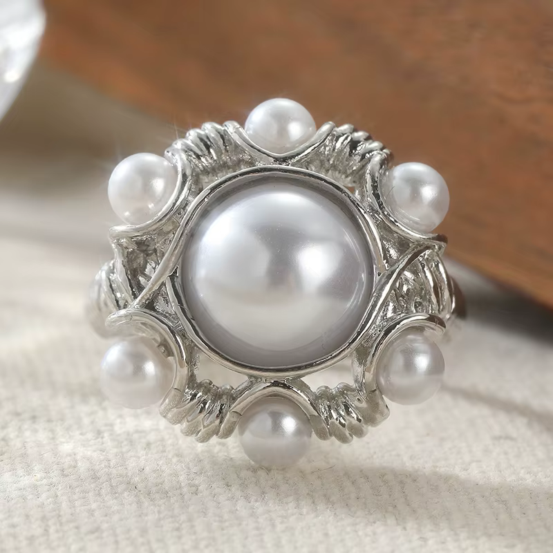Bague élégante et luxueuse en imitation perle florale plaquée argent pour femme, accessoire de mode 