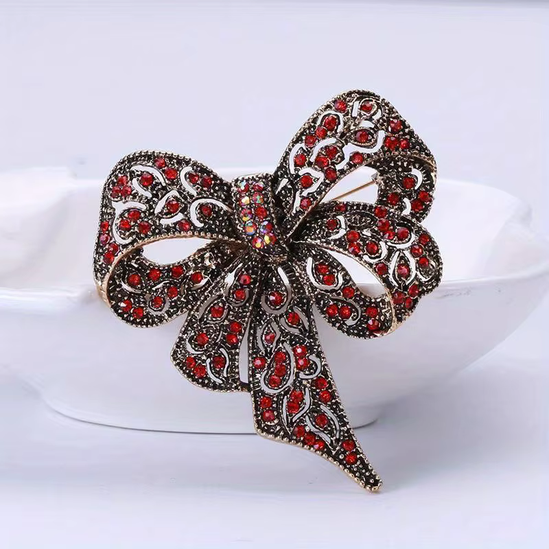 Broches de ruban à nœud en cristal de luxe pour femmes et hommes, épingles à nœud papillon à la mode