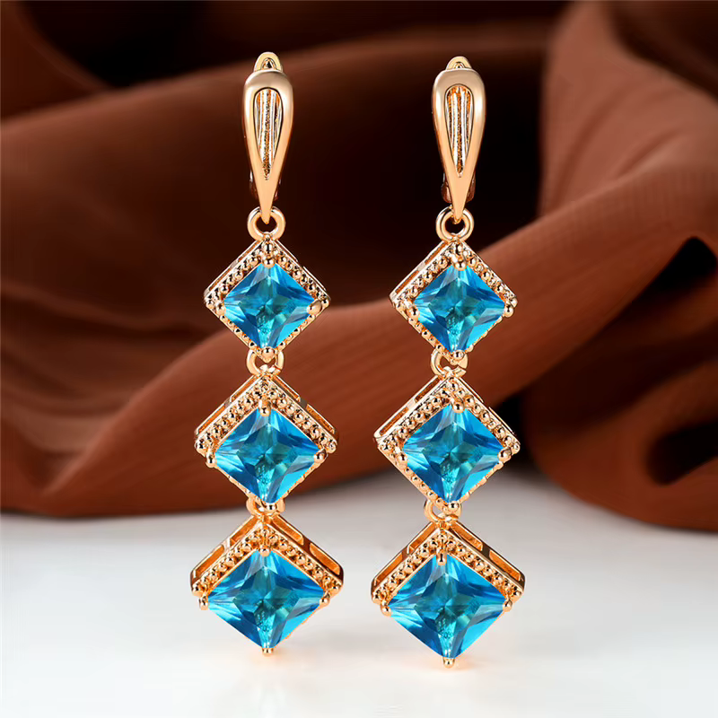Boucles d'oreilles à Clip en pierre de naissance couleur or Rose, longue pierre de Zircon bleue, bij