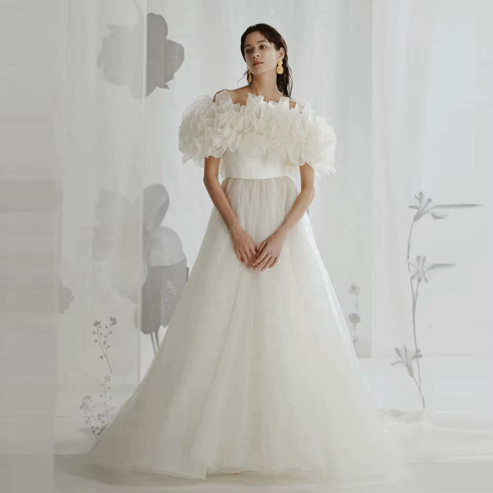 Robe de mariée de luxe en maille à épaules dénudées, coupe trapèze romantique, avec manches nuage en