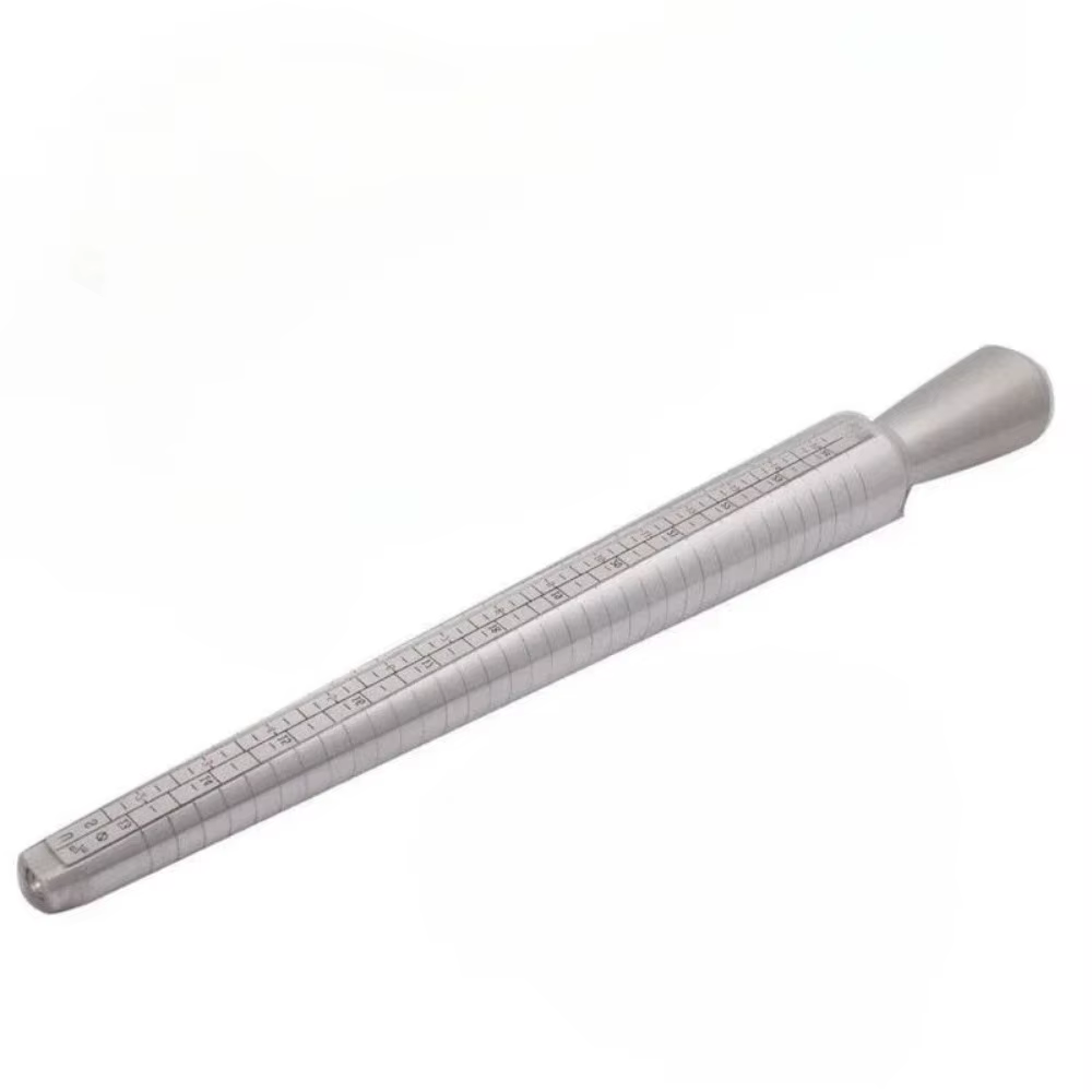 Kit d'outils de mesure pour bagues en métal, comprenant un mandrin de mesure et un outil pour doigts