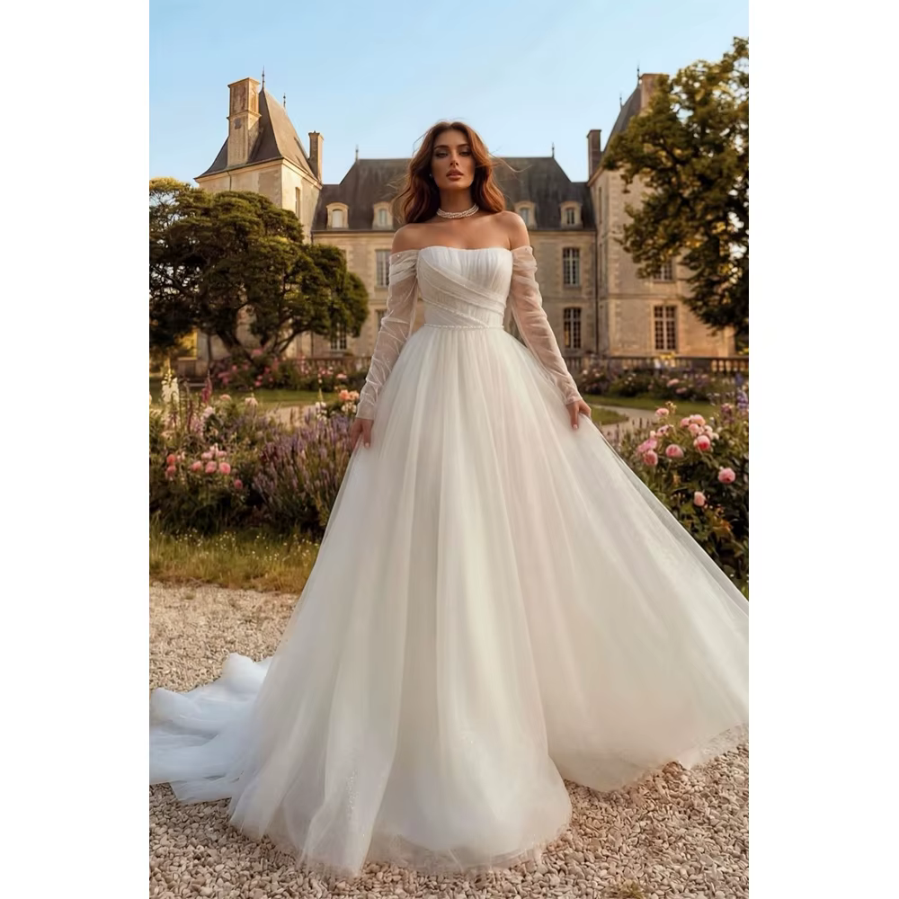 Robe de mariée personnalisée style bohème coupe trapèze, épaules dénudées, décolleté cœur, en tulle 