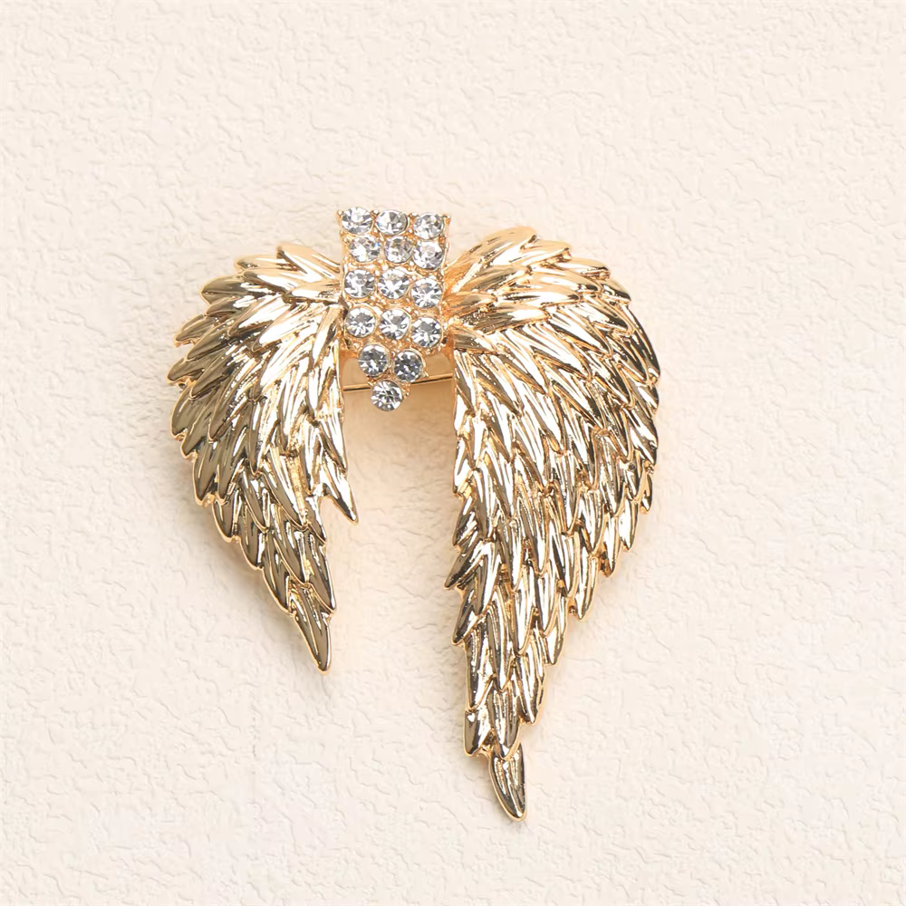 Broche à nœud en cristal de luxe pour femmes, série à la mode, haut de gamme, exquise, pour manteau,