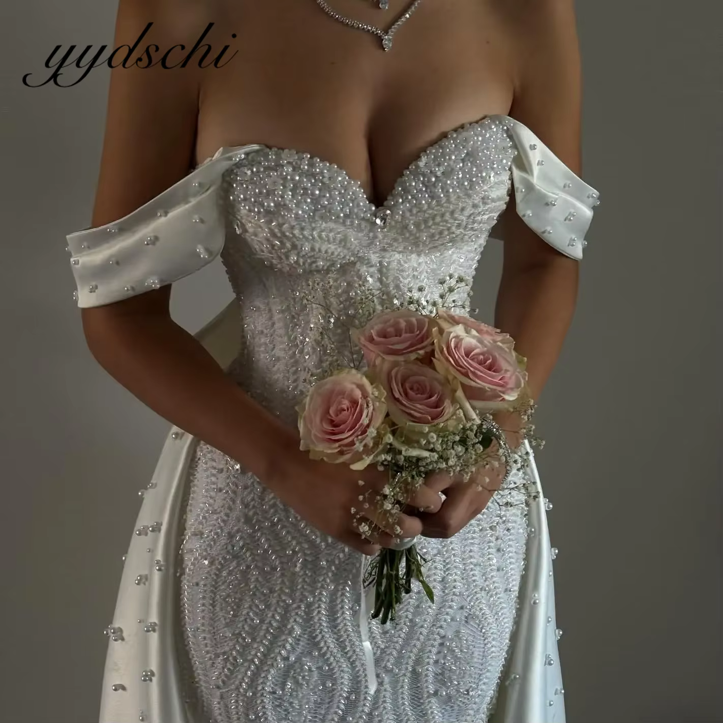 Personnalisé hors de l'épaule perles robes de mariée perles arc Train robe de mariée chérie ivoire n