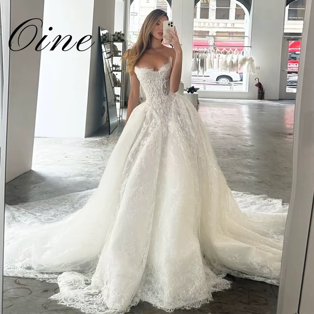 Oine Exquisite Nouveauté 2026 Robes de mariée coupe A-line plissées, ornées de perles et de dentelle