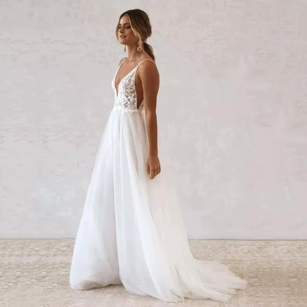 Robes de mariée bohèmes 2026 sexy à col en V profond, appliques en dentelle, dos nu, robe de mariée 