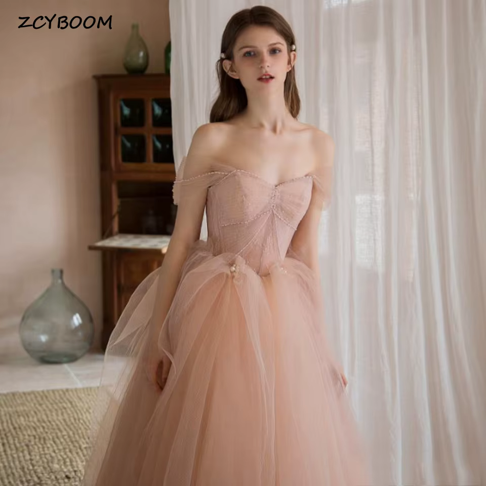 Robes de mariée élégantes à col bateau, dos ouvert, ornées de perles, 2026, modernes, longueur au so