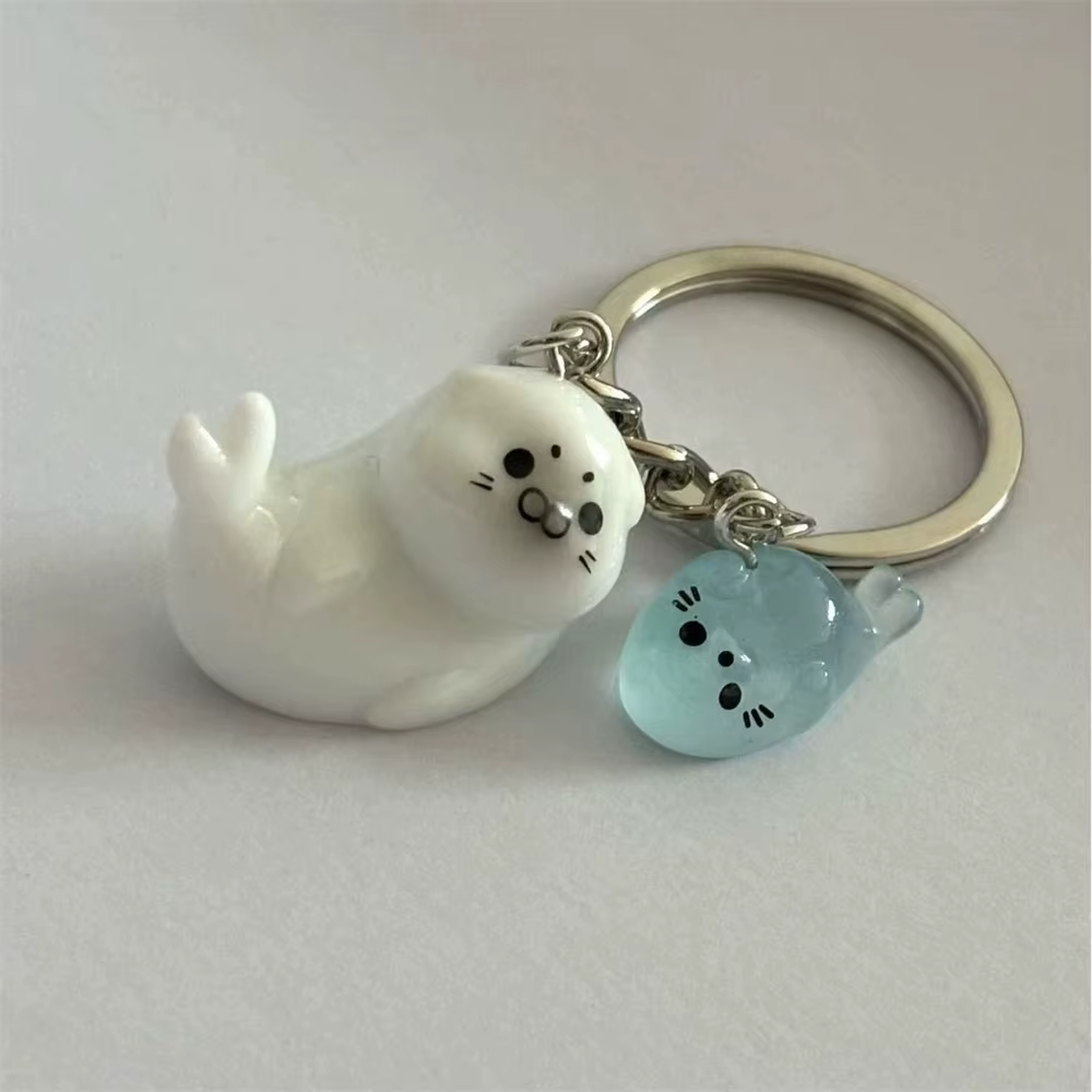 Mignon blanc 3D lumineux Lion de mer porte-clés clé pour femmes conception Simple Animal porte-clés 