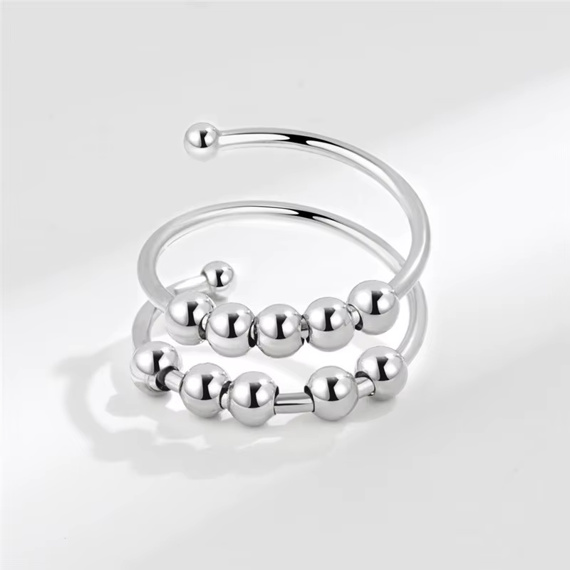 Bague anti-stress rotative de luxe en forme de rose pour femme, avec breloque cœur, ajustable, motif