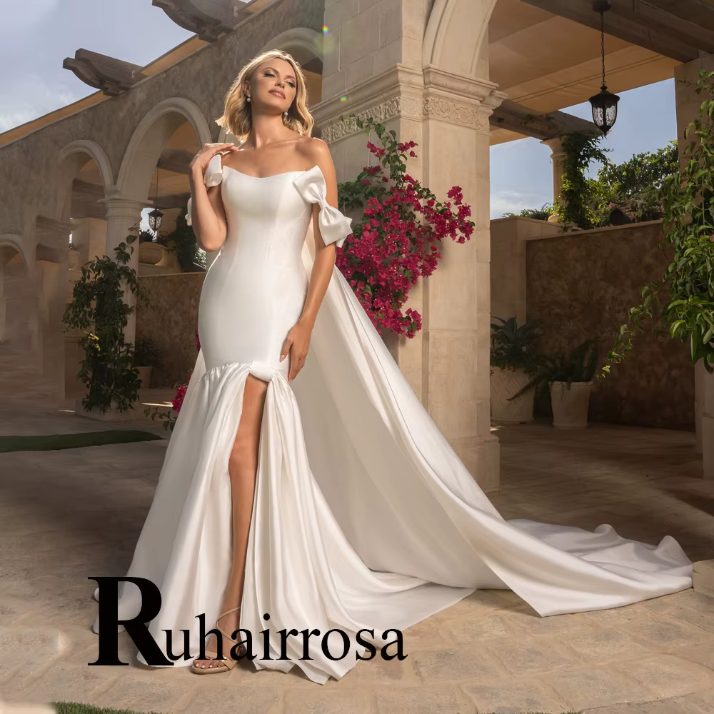 Ruhair fantaisie hors de l'épaule robes de mariée pour mariée nœuds papillon fente cape pli trompett