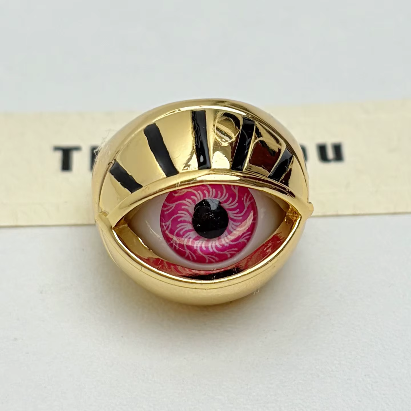 Bague ajourée en forme de sphère
