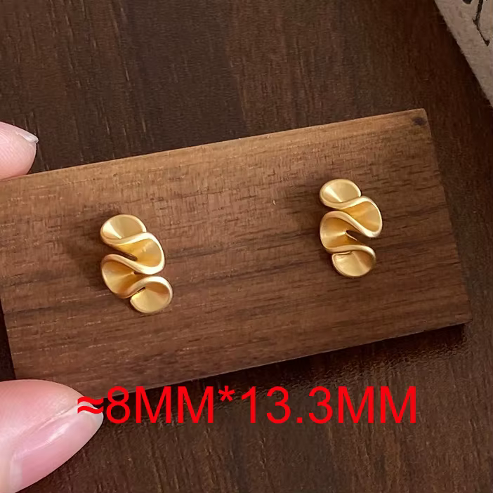 Boucles d'oreilles clous torsadées couleur argent pour femme, bijoux de mode minimalistes et tendanc