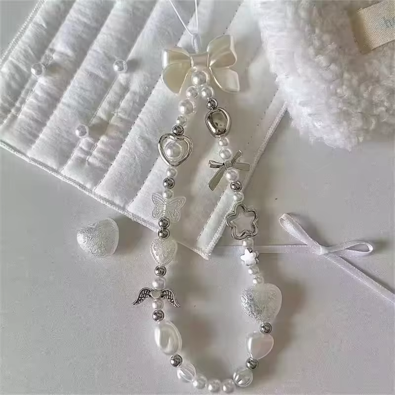 Chaîne de téléphone coréenne en perles de cœur avec nœud papillon blanc, mignon, pour appareil photo