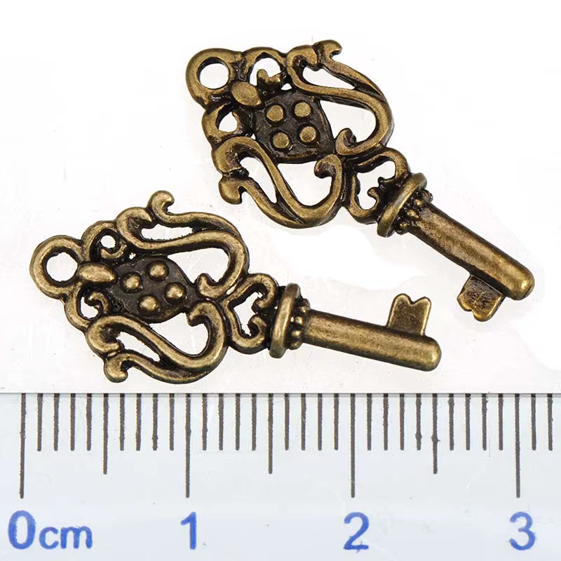 Accessoires en métal bronze antique, matériel pour bijoux fantaisie, breloques clés, boucles d'oreil
