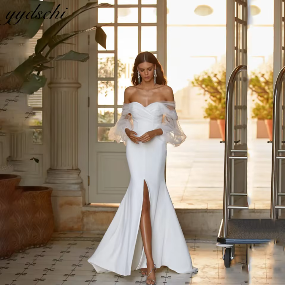 Robe de mariée sirène blanche dos nu style romance française avec voile, taille mi-haute et manches 