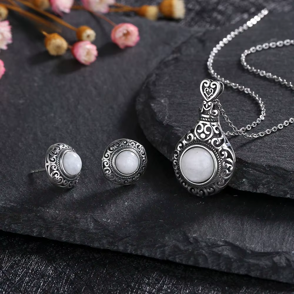 Parure de bijoux élégante en argent plaqué avec pierre de lune naturelle, boucles d'oreilles et coll