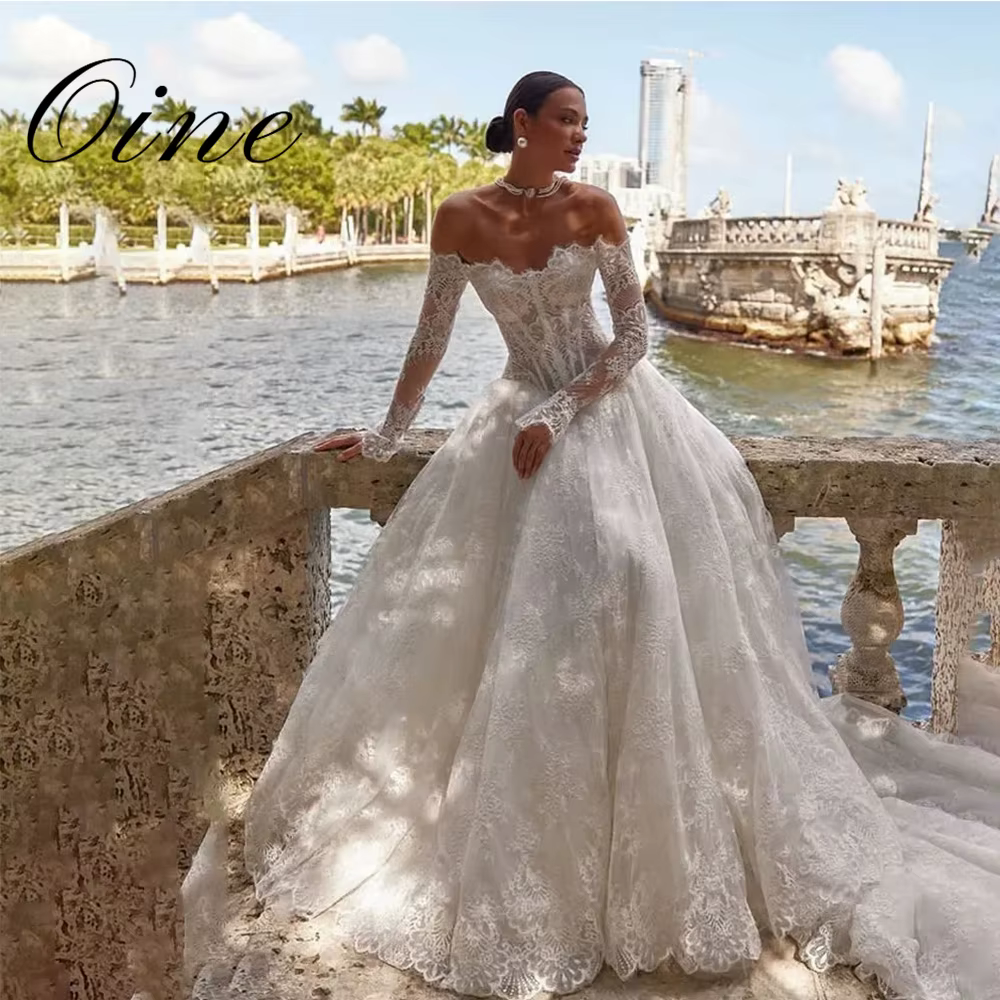Oine bohème épaules dénudées une ligne dentelle Appliques robe De mariée manches longues exquis robe