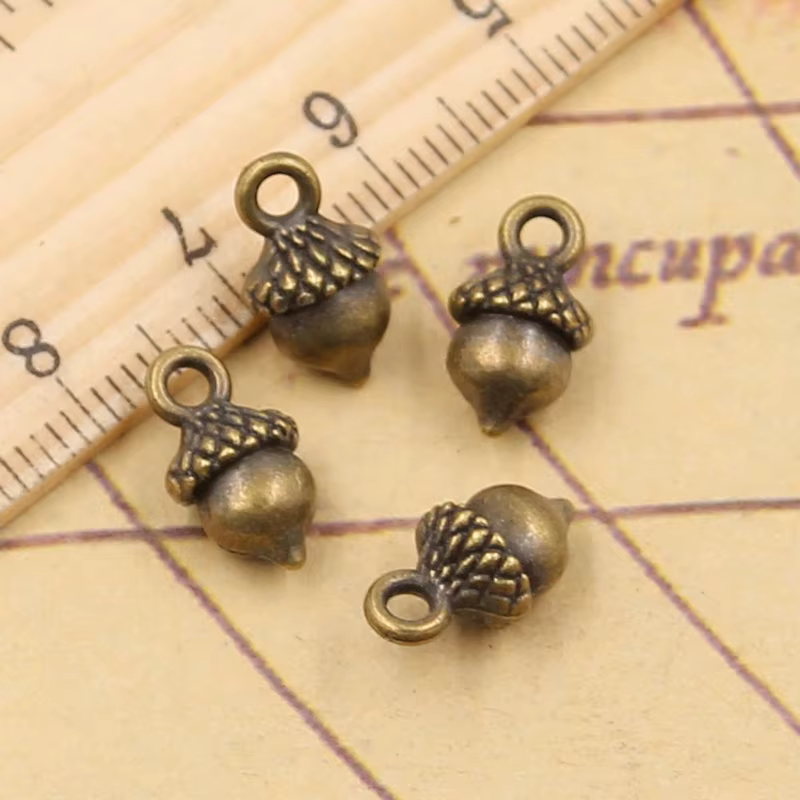 Breloques en forme de noisette tibétaine, 20 pièces, 13x8x6mm, argent, pour document, bijoux anciens